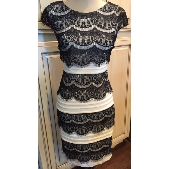 white dress with black lace overlay